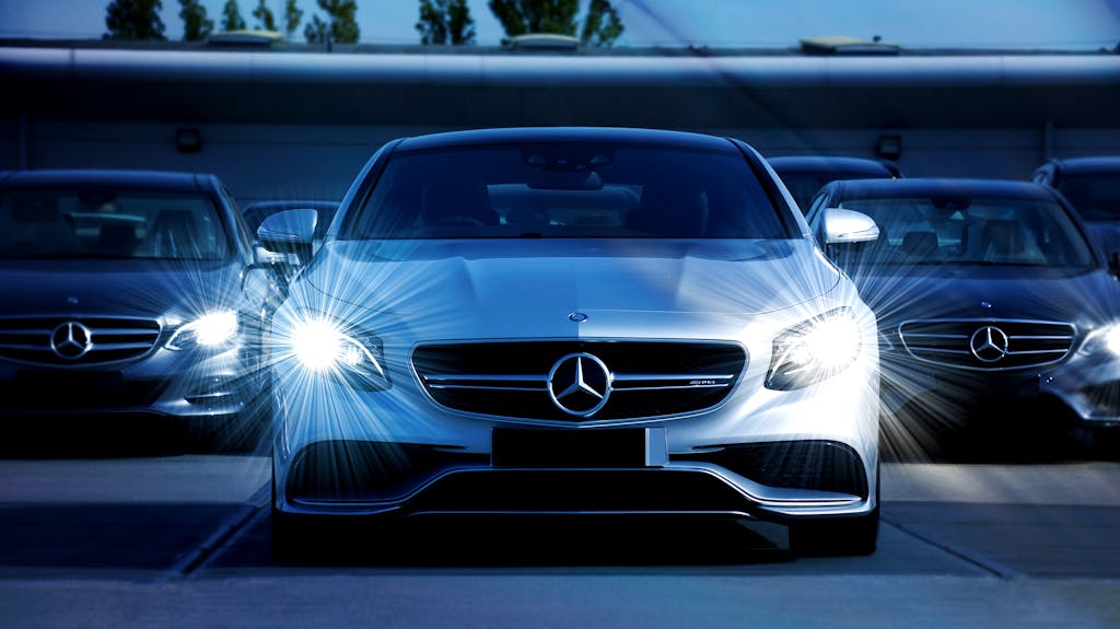White Mercedes Benz Car with the best LED headlight bulbs in night